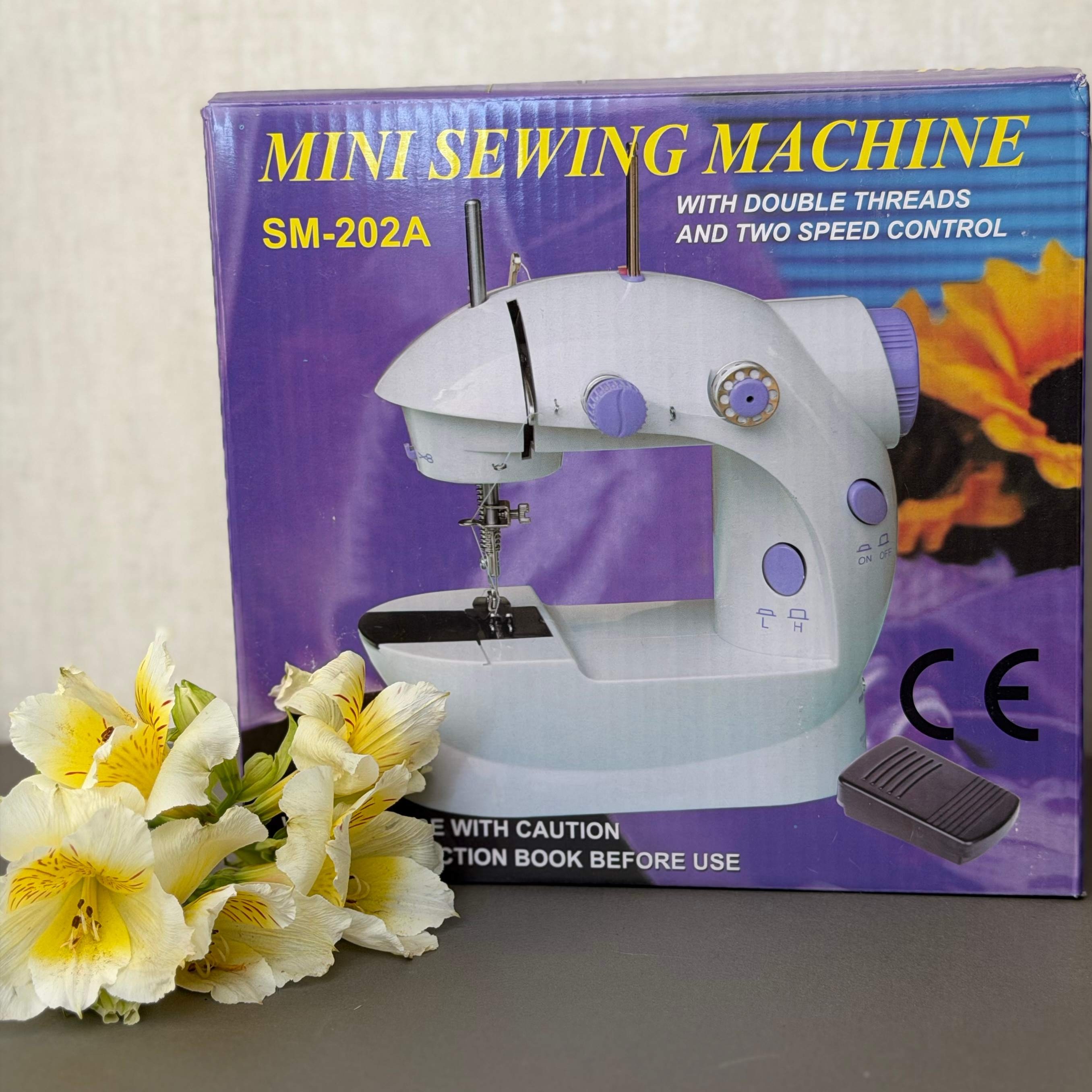 چرخ خیاطی مینی مدل SM_202A با لیبل اورجینال لیزری